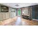 Finished basement featuring built in shelving and cabinets at 745 Devon Hill Ct, Roswell, GA 30075