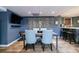 Basement dining area with bar and seating, perfect for entertaining at 745 Devon Hill Ct, Roswell, GA 30075