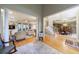 Open-concept layout from foyer to living room and dining room with hardwood floors at 745 Devon Hill Ct, Roswell, GA 30075