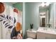Bathroom with a sink, modern decor and shower curtain, providing a clean and vibrant design at 45 Pine Tree Dr, Mcdonough, GA 30252