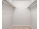 Walk-in closet with shelving, ready for organizing wardrobe and accessories, with ample space at 45 Pine Tree Dr, Mcdonough, GA 30252