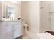 Bathroom featuring white cabinets, a glass-enclosed shower, and modern fixtures at 89 E Andrews Nw Dr, Atlanta, GA 30305