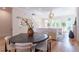 Charming dining area featuring hardwood floors, modern decor, and lots of natural light at 89 E Andrews Nw Dr, Atlanta, GA 30305