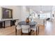 Cozy dining room with hardwood floors, modern decor and an open-concept layout at 89 E Andrews Nw Dr, Atlanta, GA 30305