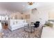 Open-concept living room with hardwood floors, modern furniture, and lots of natural light at 89 E Andrews Nw Dr, Atlanta, GA 30305