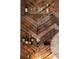 Close-up of stylish bar area with unique wood paneling and decorative glassware at 1178 Roxboro Ne Cv, Atlanta, GA 30324