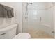 Bathroom showing glass enclosed shower with bench and tiled walls at 1178 Roxboro Ne Cv, Atlanta, GA 30324