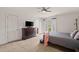Comfortable bedroom with dresser and television, with natural light at 1178 Roxboro Ne Cv, Atlanta, GA 30324