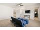 Bedroom showing vanity with sink and a lounge couch at 1178 Roxboro Ne Cv, Atlanta, GA 30324