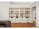 Living room with hardwood floors and built in bookcase at 1178 Roxboro Ne Cv, Atlanta, GA 30324