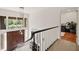 Bright entryway features a solid wood front door, transom windows, and a modern chandelier at 1178 Roxboro Ne Cv, Atlanta, GA 30324