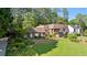 Beautiful home featuring well-manicured lawn and mature trees at 1178 Roxboro Ne Cv, Atlanta, GA 30324