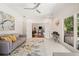 Bright living room featuring stylish furnishings and seamless flow to outdoor spaces at 1178 Roxboro Ne Cv, Atlanta, GA 30324