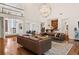 Open-concept living room with a vaulted ceiling and hardwood floors at 1178 Roxboro Ne Cv, Atlanta, GA 30324