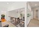 Second story view of a living room with vaulted ceilings, dark trim, and modern chandelier at 1178 Roxboro Ne Cv, Atlanta, GA 30324