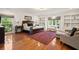 Spacious main bedroom with hardwood floors, custom built-ins, and large windows at 1178 Roxboro Ne Cv, Atlanta, GA 30324