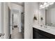 Bright bathroom with a modern vanity and framed mirror, complemented by neutral-toned walls at 2251 Nancy Creek Dr, Atlanta, GA 30341
