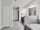Bright bathroom featuring a soaking tub, modern fixtures, and a spacious layout with tile flooring at 2251 Nancy Creek Dr, Atlanta, GA 30341