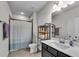 Bright bathroom featuring a vanity with mirror, toilet, and shower with modern fixtures at 2251 Nancy Creek Dr, Atlanta, GA 30341