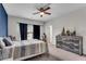 Comfortable bedroom with a large bed, modern decor, and plenty of natural light, creating a serene retreat at 2251 Nancy Creek Dr, Atlanta, GA 30341