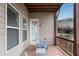 Inviting covered porch with outdoor seating, ideal for relaxing and enjoying the outdoors at 2251 Nancy Creek Dr, Atlanta, GA 30341