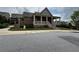 Charming home with a covered front porch, classic design elements, and a well-manicured lawn in a friendly neighborhood at 2251 Nancy Creek Dr, Atlanta, GA 30341