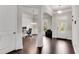 Welcoming foyer featuring hardwood floors, classic architectural details, and a view into the front office at 2251 Nancy Creek Dr, Atlanta, GA 30341
