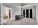Cozy seating area off the main bedroom offers a comfortable couch and relaxing atmosphere at 2251 Nancy Creek Dr, Atlanta, GA 30341