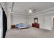 Comfortable main bedroom with neutral carpet, ceiling fan, and furnishings including a dresser at 2251 Nancy Creek Dr, Atlanta, GA 30341