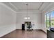 Bright office space with wainscoting, hardwood floors, and ample natural light, ideal for remote work at 2251 Nancy Creek Dr, Atlanta, GA 30341