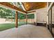 Covered patio with outdoor grill area and view of fenced backyard at 535 Shamrock Dr, Cumming, GA 30040