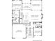 First floor plan showcasing spacious kitchen, living areas, and covered porches for seamless indoor-outdoor living at 535 Shamrock Dr, Cumming, GA 30040