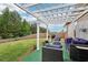 Inviting backyard patio area with pergola, ideal for outdoor entertaining at 537 Daffodil Ln, Mcdonough, GA 30253