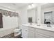 This bathroom has double sinks, modern fixtures, and a shower/tub combo at 537 Daffodil Ln, Mcdonough, GA 30253