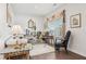 Bright and airy living room is decorated with stylish furniture and decor at 537 Daffodil Ln, Mcdonough, GA 30253