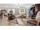 Open-concept living room features luxurious seating, warm lighting, and upscale décor at 537 Daffodil Ln, Mcdonough, GA 30253