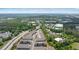 Aerial showcases well-planned community near local amenities, featuring tree-lined streets and easy access to highways at 933 Catamaran Ct, Alpharetta, GA 30005