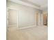 Large bedroom with neutral walls and carpet, with open closet, bright and spacious at 933 Catamaran Ct, Alpharetta, GA 30005