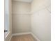 Organized walk-in closet featuring wire shelving for efficient storage at 933 Catamaran Ct, Alpharetta, GA 30005