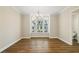 Bright dining room features a modern chandelier and large windows at 933 Catamaran Ct, Alpharetta, GA 30005