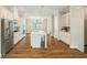 Stylish kitchen with stainless appliances, large island, and ample cabinet space at 933 Catamaran Ct, Alpharetta, GA 30005