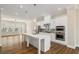 Spacious kitchen boasting a large island, stainless appliances, and modern finishes at 933 Catamaran Ct, Alpharetta, GA 30005