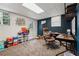 Finished basement area with an office space, carpeted floors, and natural light at 1154 Pair Sw Rd, Marietta, GA 30060