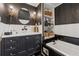 Stylish bathroom features a modern vanity, bathtub, and elegant decor at 1154 Pair Sw Rd, Marietta, GA 30060