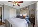 Comfortable bedroom features soft gray walls, ceiling fan, and stylish decor at 1154 Pair Sw Rd, Marietta, GA 30060