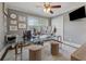 Home office area with a glass desk, modern decor, and patterned rug at 1154 Pair Sw Rd, Marietta, GA 30060