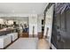 Stylish foyer with hardwood floors leading to the kitchen and dining area at 1154 Pair Sw Rd, Marietta, GA 30060