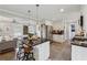 Modern kitchen with granite counters, stainless steel appliances, and breakfast bar at 1154 Pair Sw Rd, Marietta, GA 30060