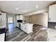 Bright, open kitchen with stainless steel appliances, white cabinets, and modern countertops at 3211 Oaktree Park Dr, Lawrenceville, GA 30044