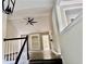 Bright living room with a built-in bookshelf, a ceiling fan, and lots of natural light at 3211 Oaktree Park Dr, Lawrenceville, GA 30044